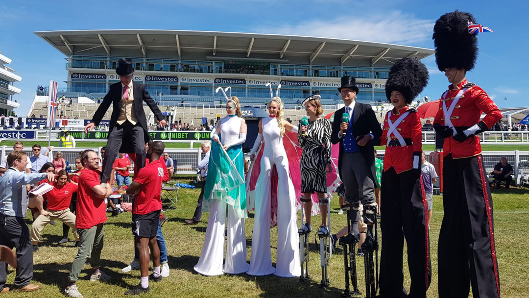 Stiltwalkers give Adapt Events guests a private show at Epsom.